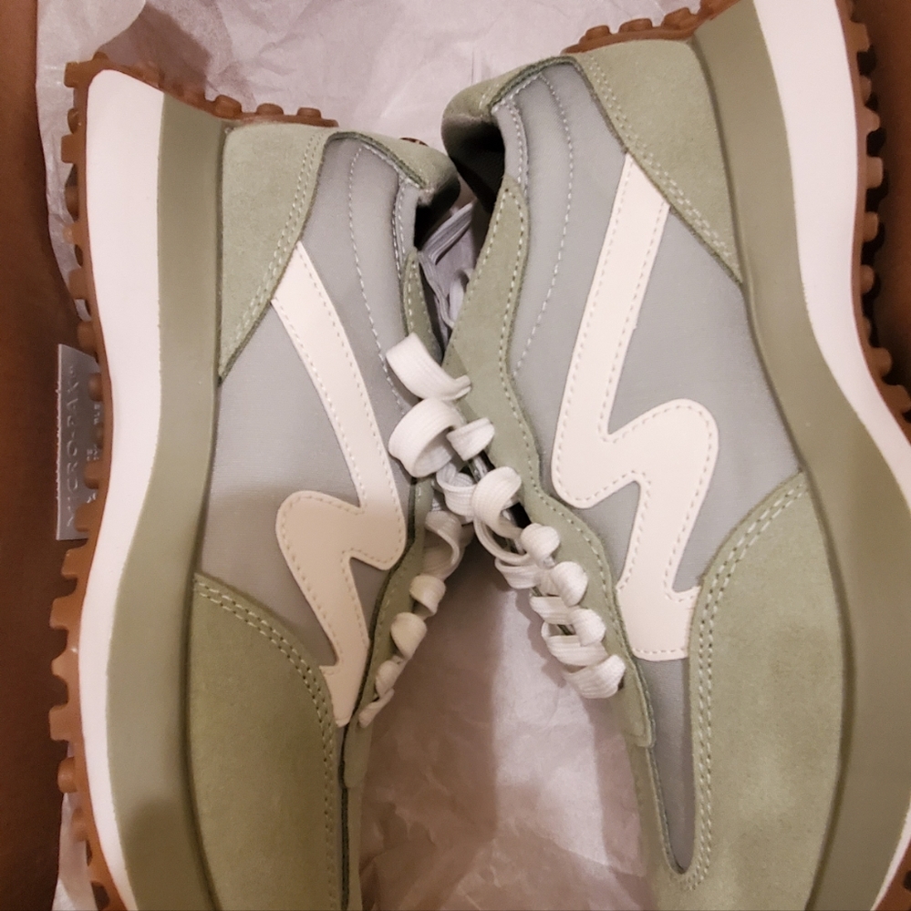 Brand new Steve Madden sneakers never been worn. Nice sage green color.
